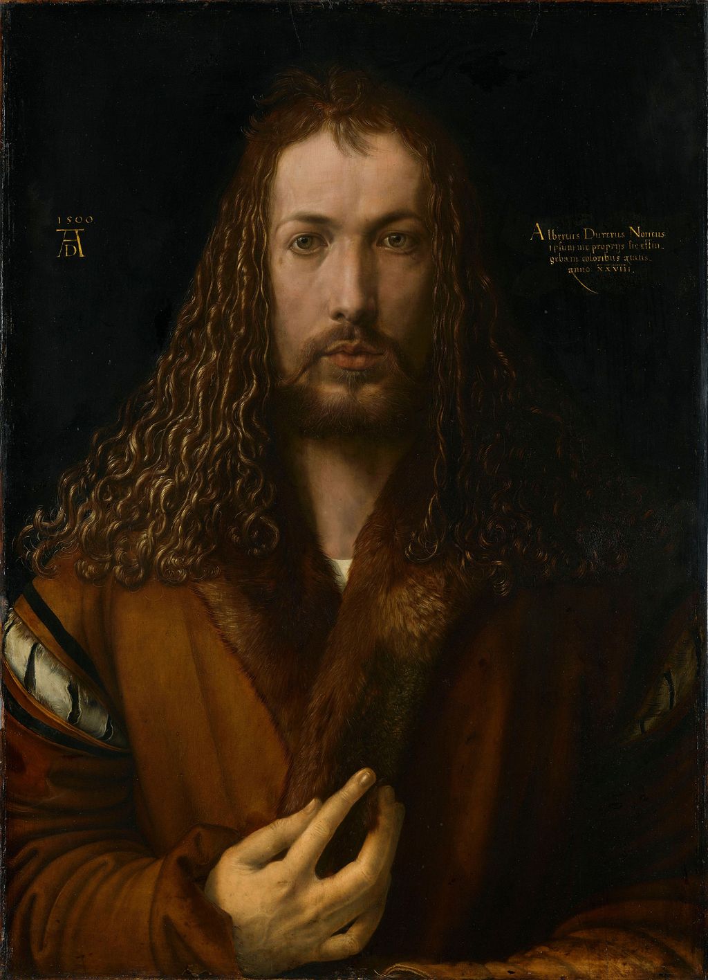 The 1500 self-portrait concentrates attention on face, hair and hand.