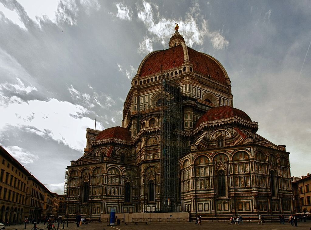 Florence Cathedral with patterned contrasting exterior materials and red tiled domes.