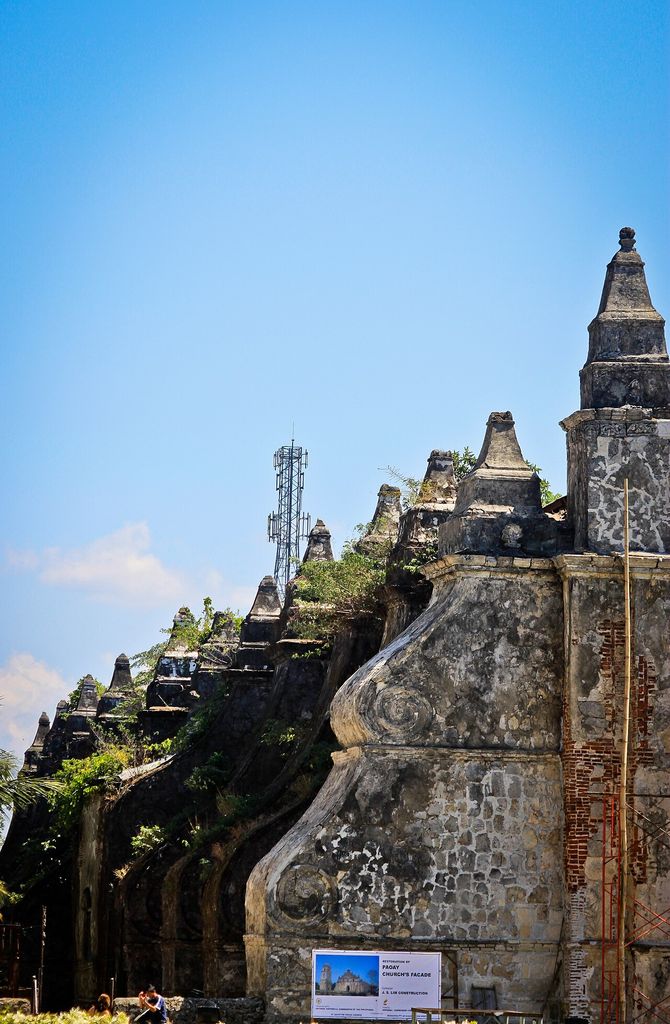 Massive stepped buttresses along the side of Paoay Church.