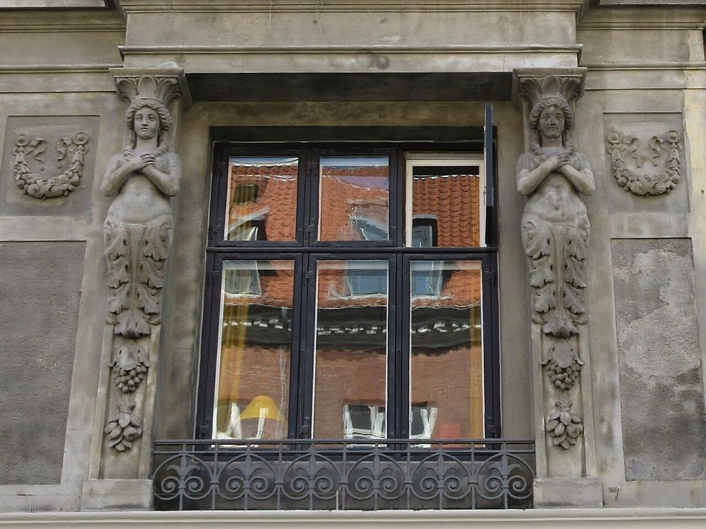 Caryatids on the facade of Herluf Trolles Gade 18 / Holbergsgade 19 in Copenhagen, Denmark