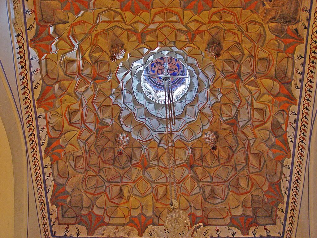 The bay in front of Mevlana's tomb (Postlar Kubbesi) is crowned with an elaborate muqarnas vault topped with a lantern.