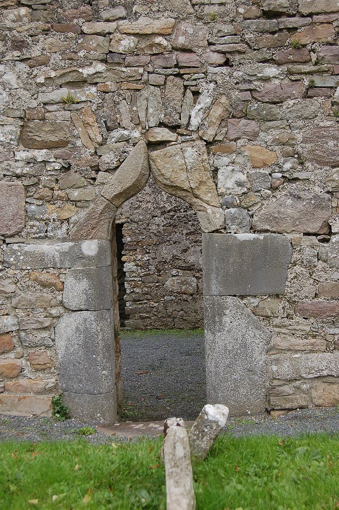 Eastern doorway in the South wall of Kilfane Church with a somewhat dislodged ogee head and limestone jambs which have spire stops (not visible in the image).