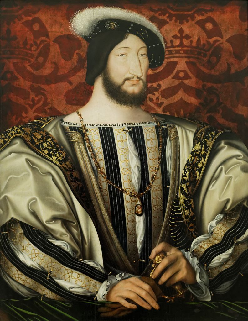 François I wears an ornate black-and-gold court costume, feathered cap and jeweled chain before a red patterned background.