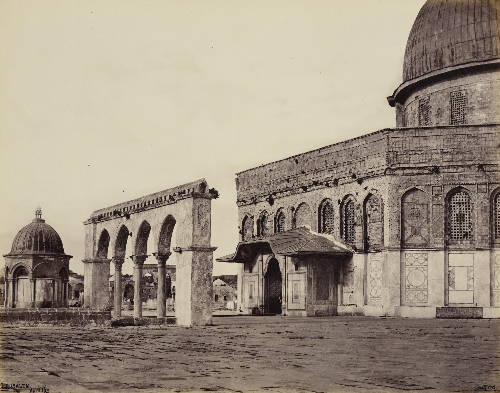 Francis Bedford’s 1862 west-facade photograph with arcade, portico and portions of outer wall lacking tile.