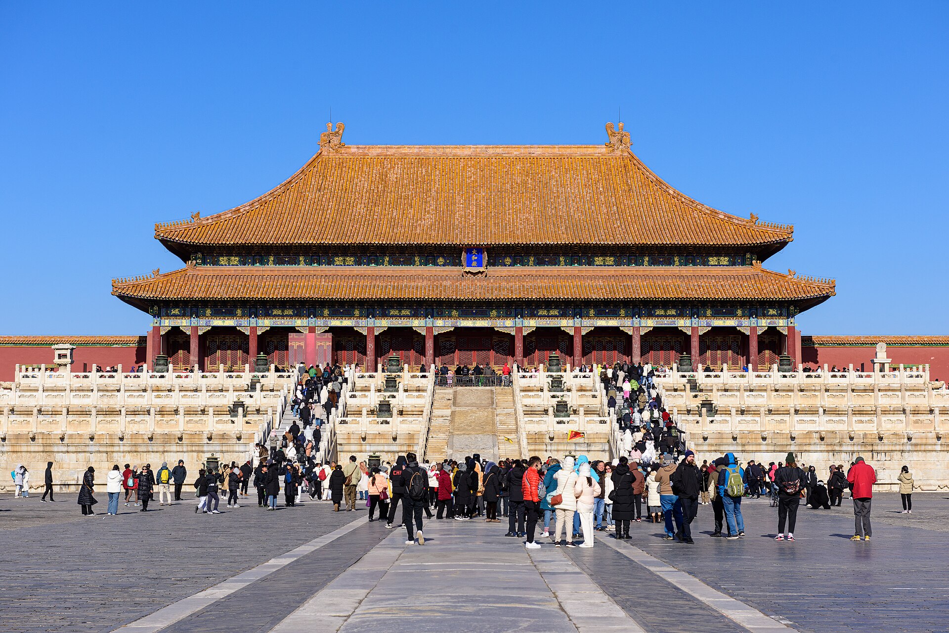 Broad paved court and visitors below the raised double-eave Hall of Supreme Harmony.