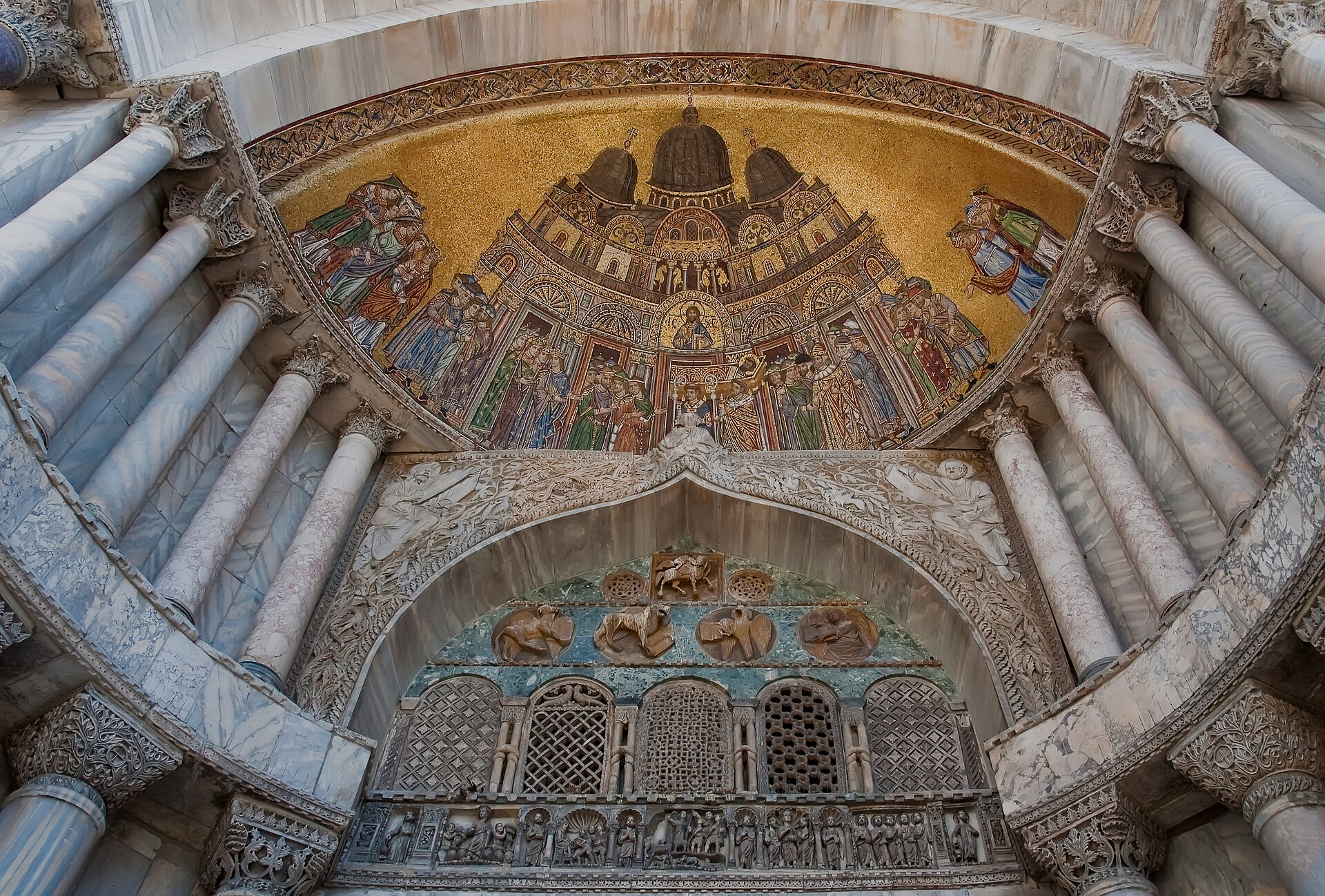 Thirteenth-century Sant’Alipio portal mosaic showing the body of St Mark received at the basilica.