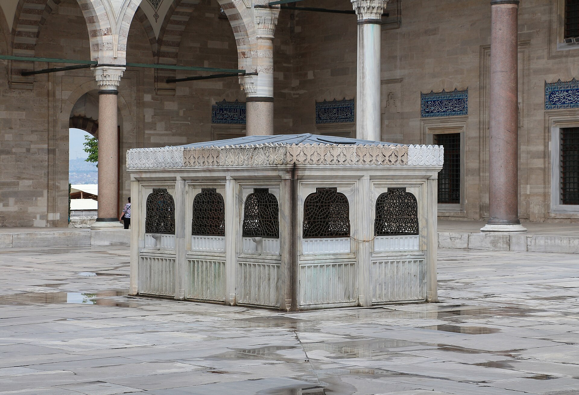 Central marble water structure in the mosque courtyard, photographed in 2014.