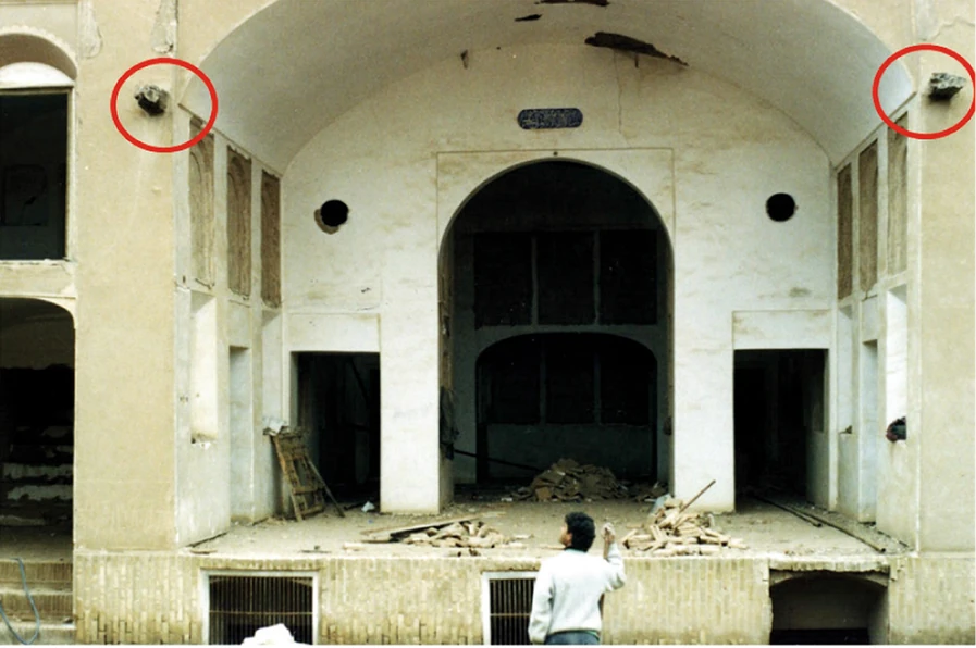 Zargar house interior with two originally red-circled timber ends at the vault impost.