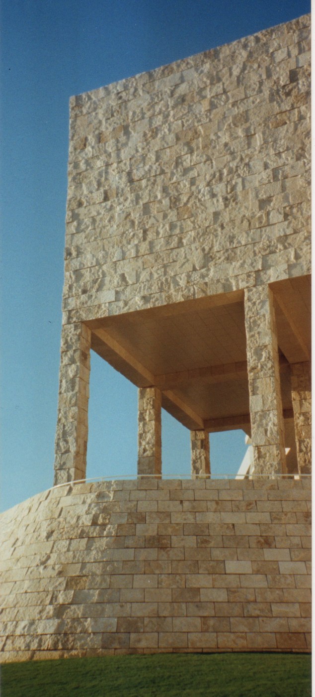 Getty Center exterior with rough travertine surfaces, rectangular courses and deeply recessed edges.