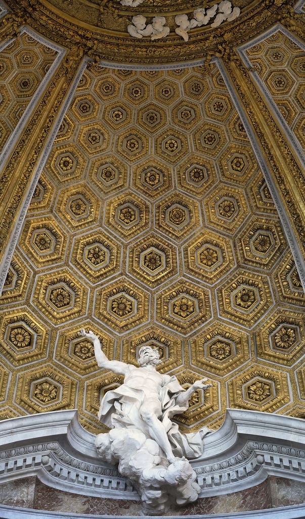 White figure of Saint Andrew on a cloud crosses a curved entablature beneath gilded geometric coffers.
