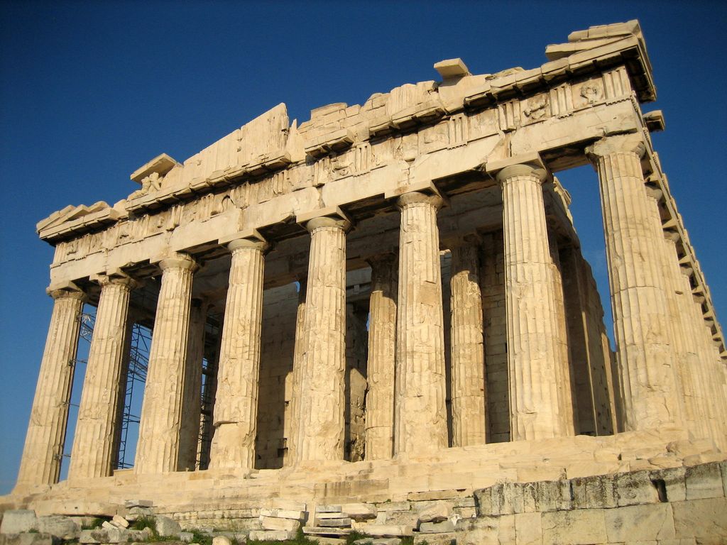 Fluted Doric columns and the stone entablature on the west side of the Parthenon.