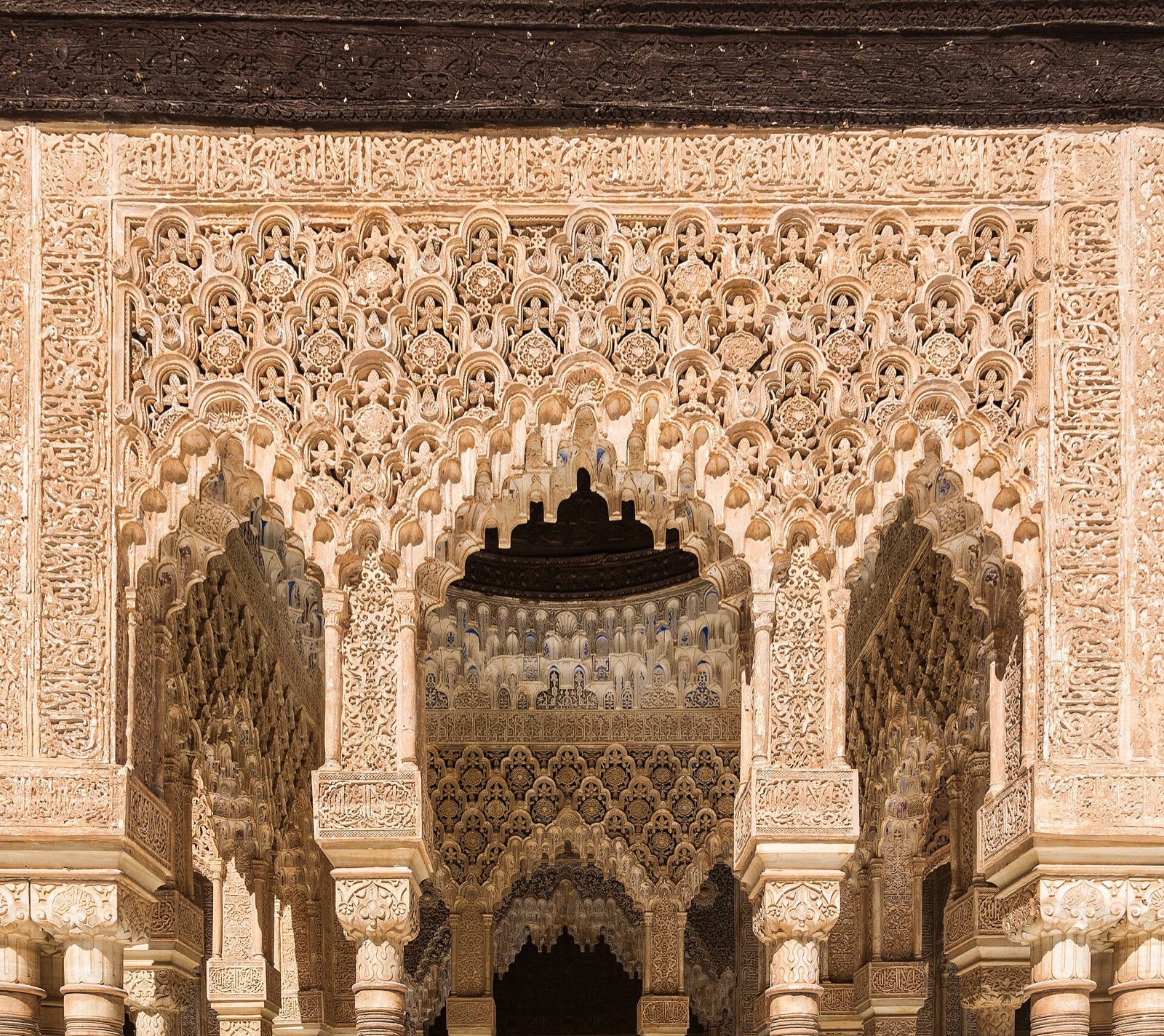 Close view of the Lions Court pavilion at the Alhambra, clustered arches, carved capitals and ornament.