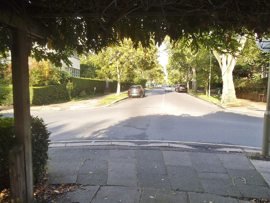 Meadway from Meadway Gate, Hampstead Garden Suburb, an architectural view.