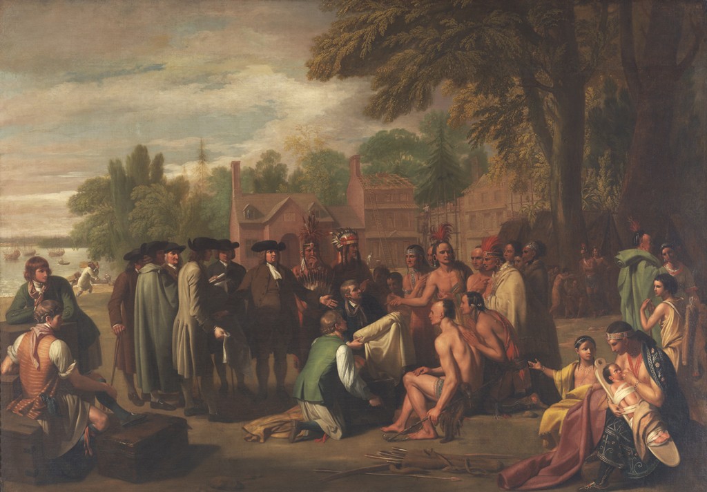 William Penn and his companions face a Lenape gathering around an unfurled cloth, with women and children at right, ships at left and buildings behind.