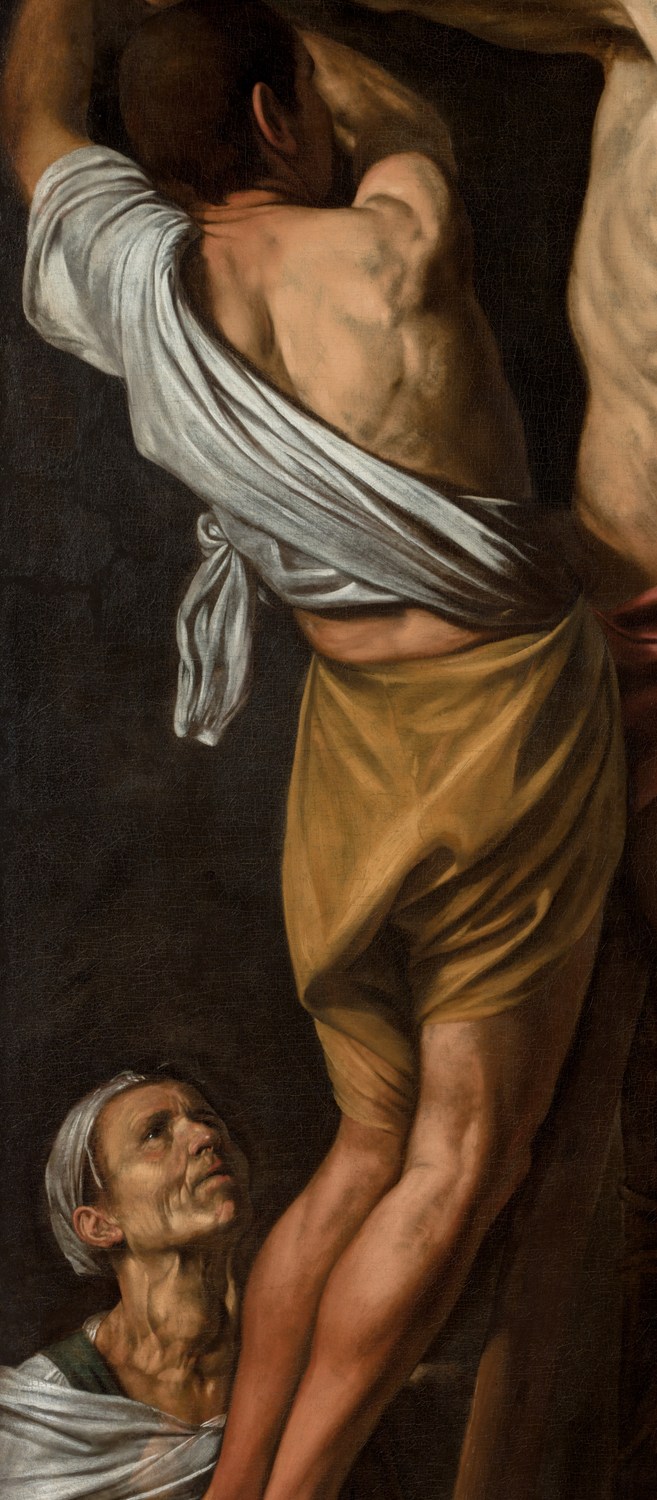 The worker at the left