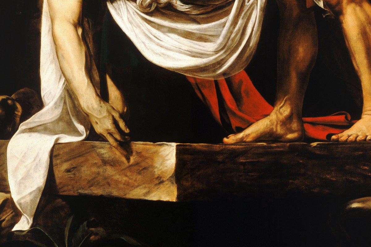 The stone and supporting hands