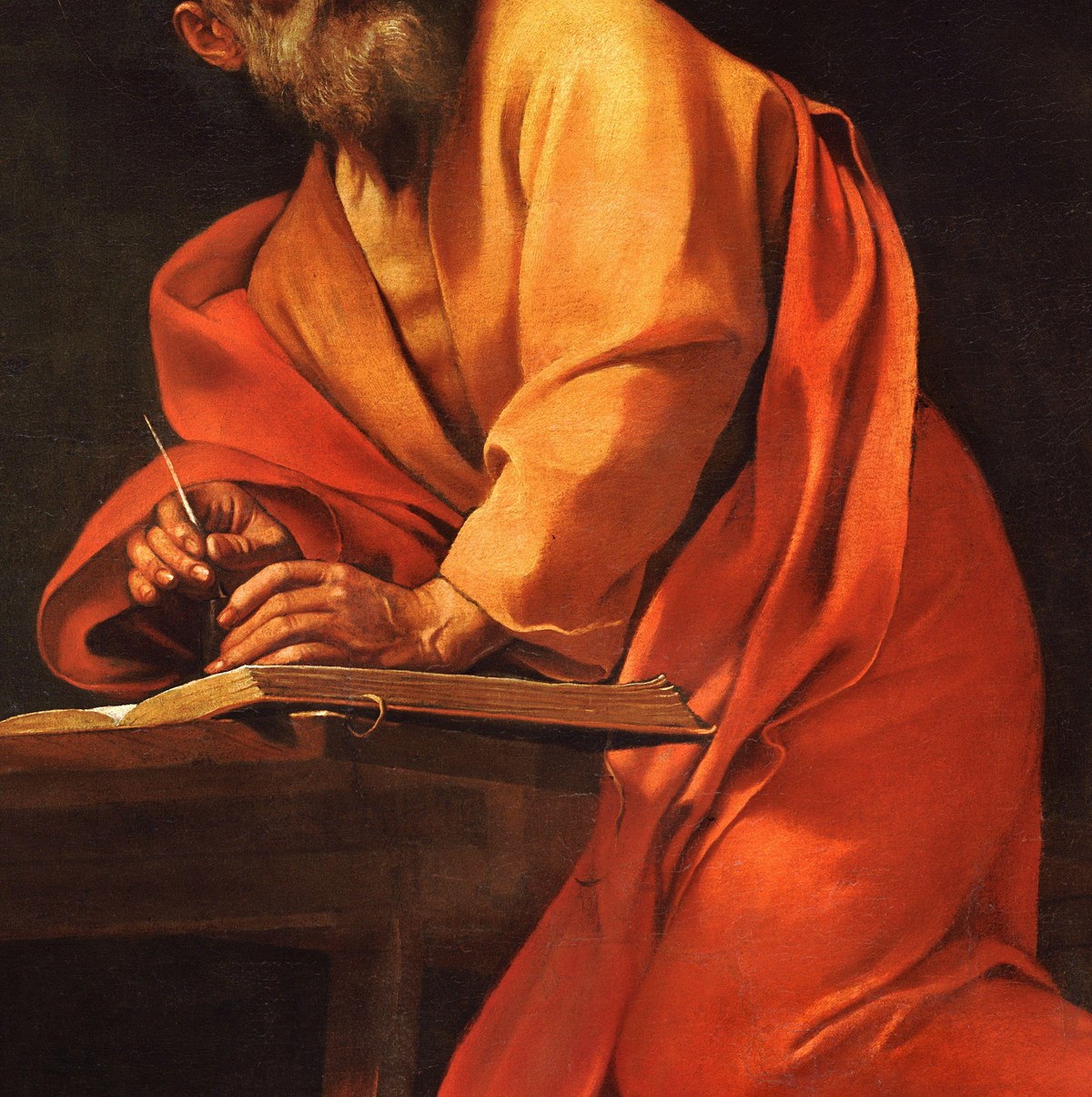 The writing hand and book
