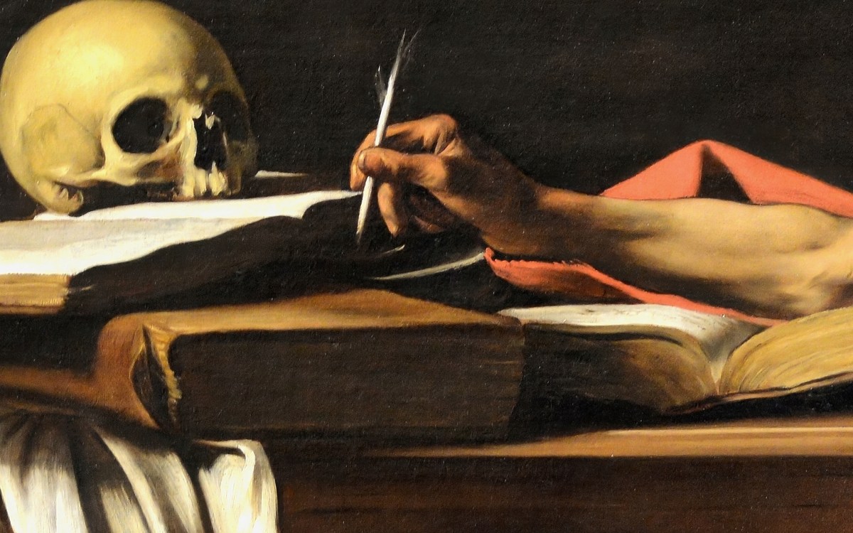 Skull and open book