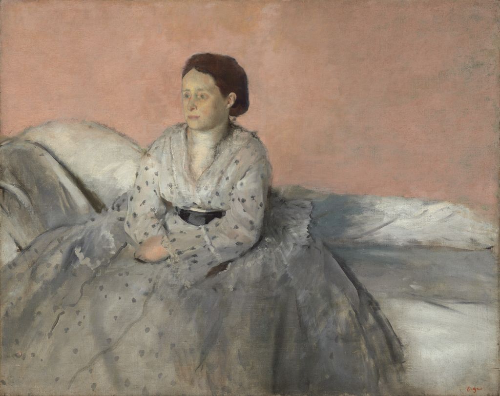 Estelle de Gas seated in a pale dotted dress