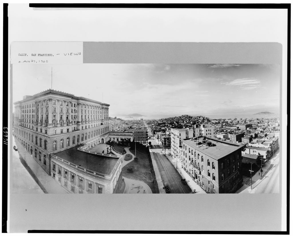 Elevated black-and-white view up Powell Street across the dense San Francisco cityscape around 1920.