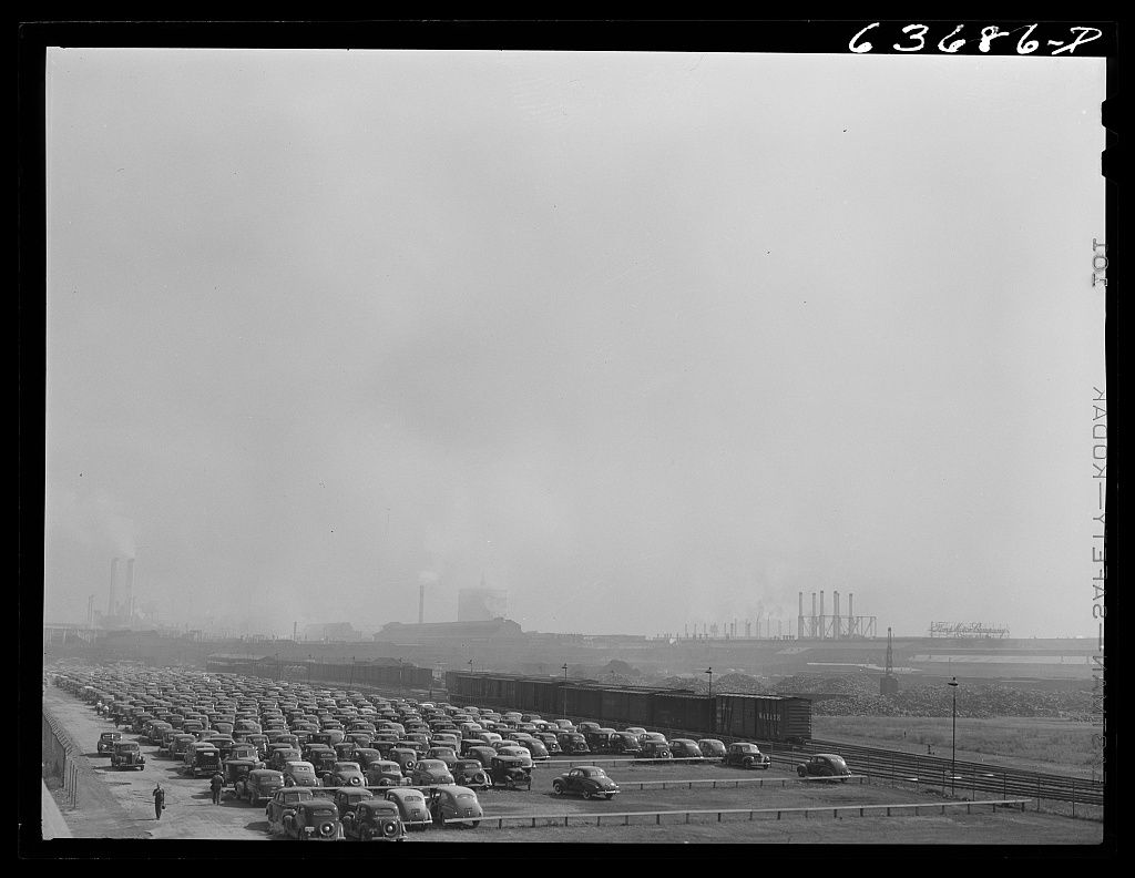 Black-and-white view of the vast Ford River Rouge industrial plant, rail lines and smokestacks in 1941.