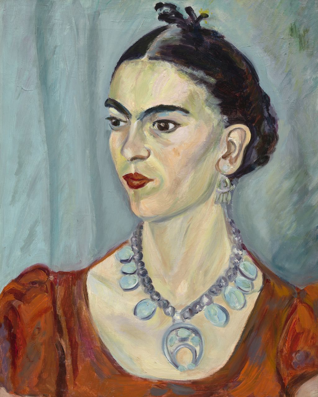 1933 painted portrait of Frida Kahlo by Magda Pach, wearing jewellery and a patterned blouse.