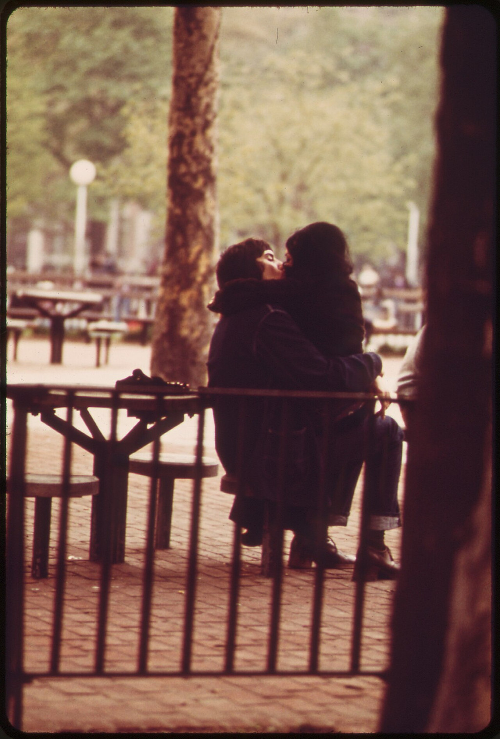Two people at a railing in Washington Square Park in 1973.