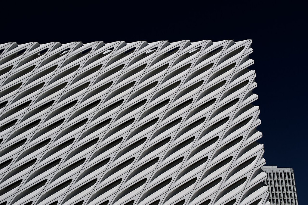 White lattice facade of The Broad against a dark sky.