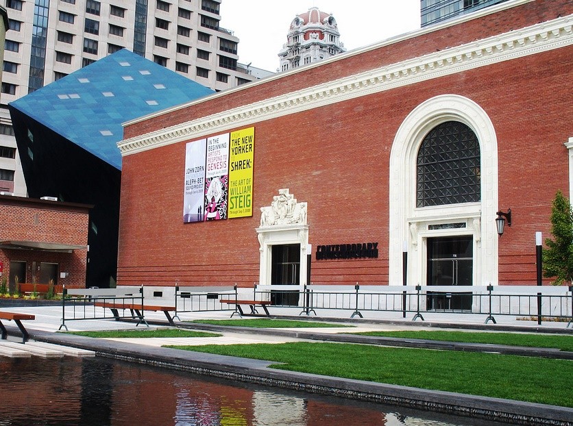 The brick facade and blue architectural cube of the Contemporary Jewish Museum in San Francisco.