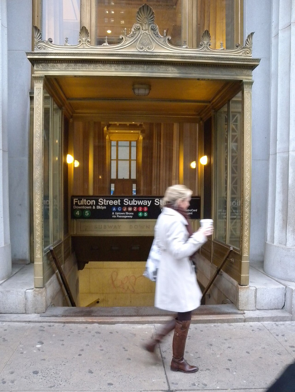 A former Fulton Street subway entrance within the facade of 195 Broadway, photographed from Dey Street.