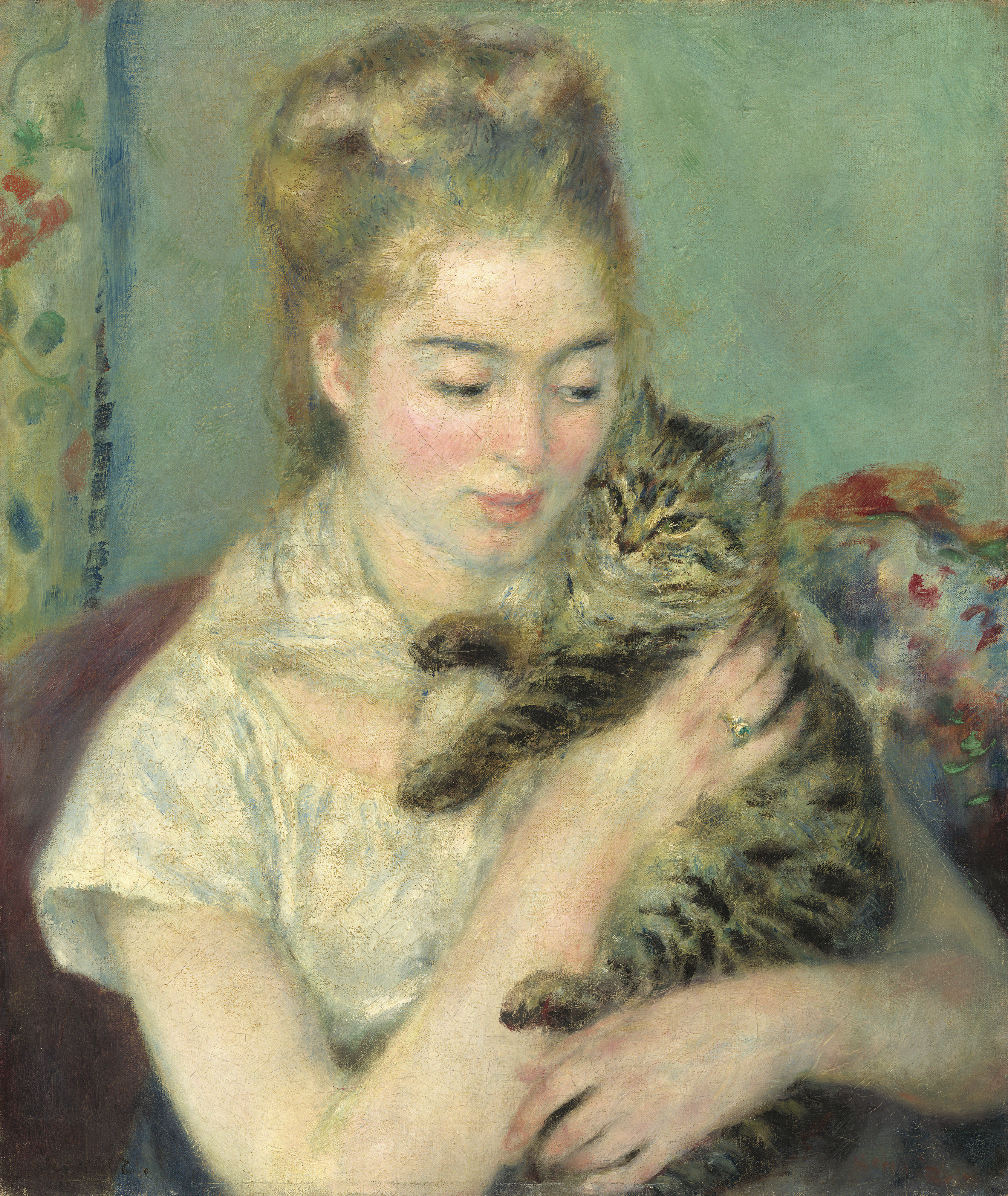 A seated woman in a pale dress holds a striped cat against her cheek in Renoir's Woman with a Cat.