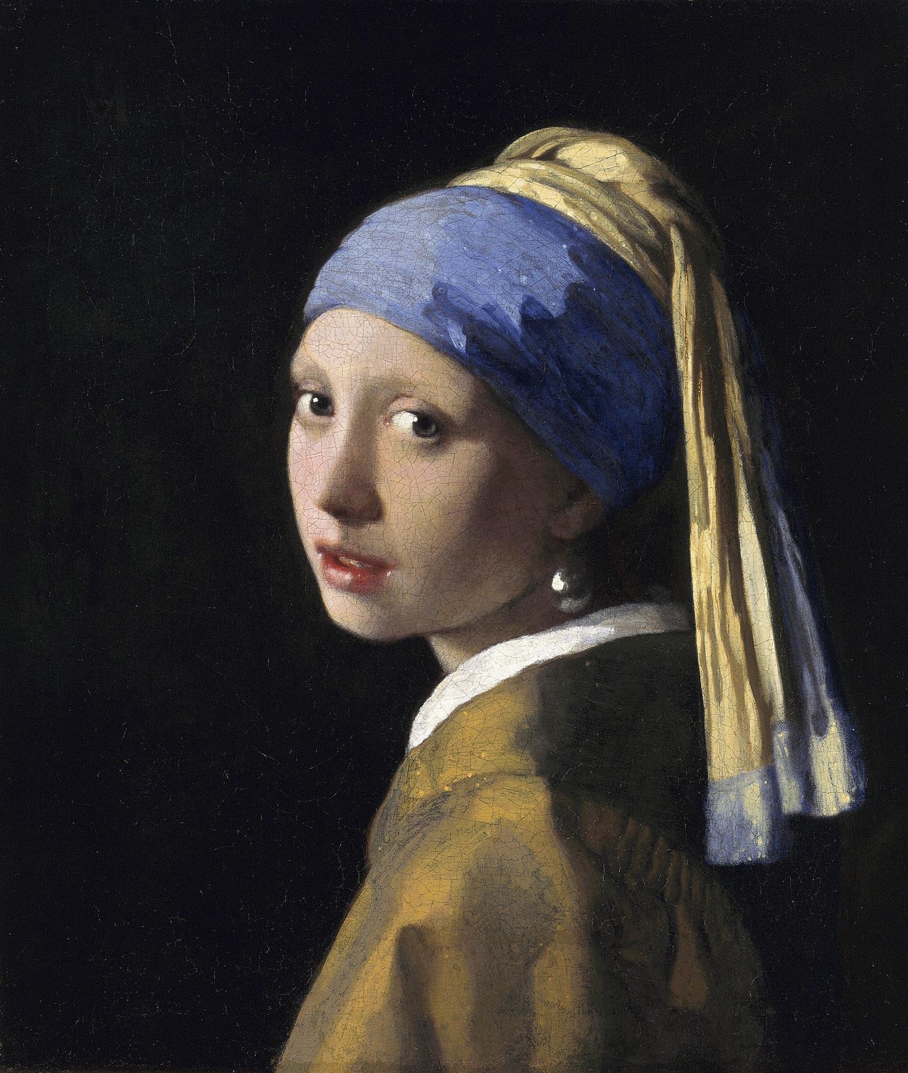 Vermeer's Girl with a Pearl Earring, a young figure in a blue and yellow head covering turning over her shoulder against a dark background.