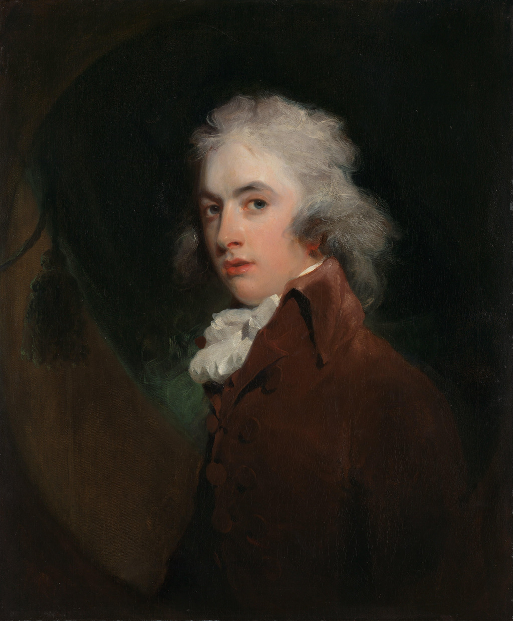 A young man with powdered light hair turns towards the viewer, wearing a brown coat and a white ruffled neckcloth against a dark background.
