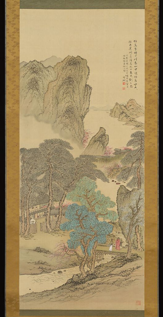 A vertical ink landscape on pale silk uses turquoise-blue and green strokes in a foreground tree with muted mountains, small pink blossoms and red seals.