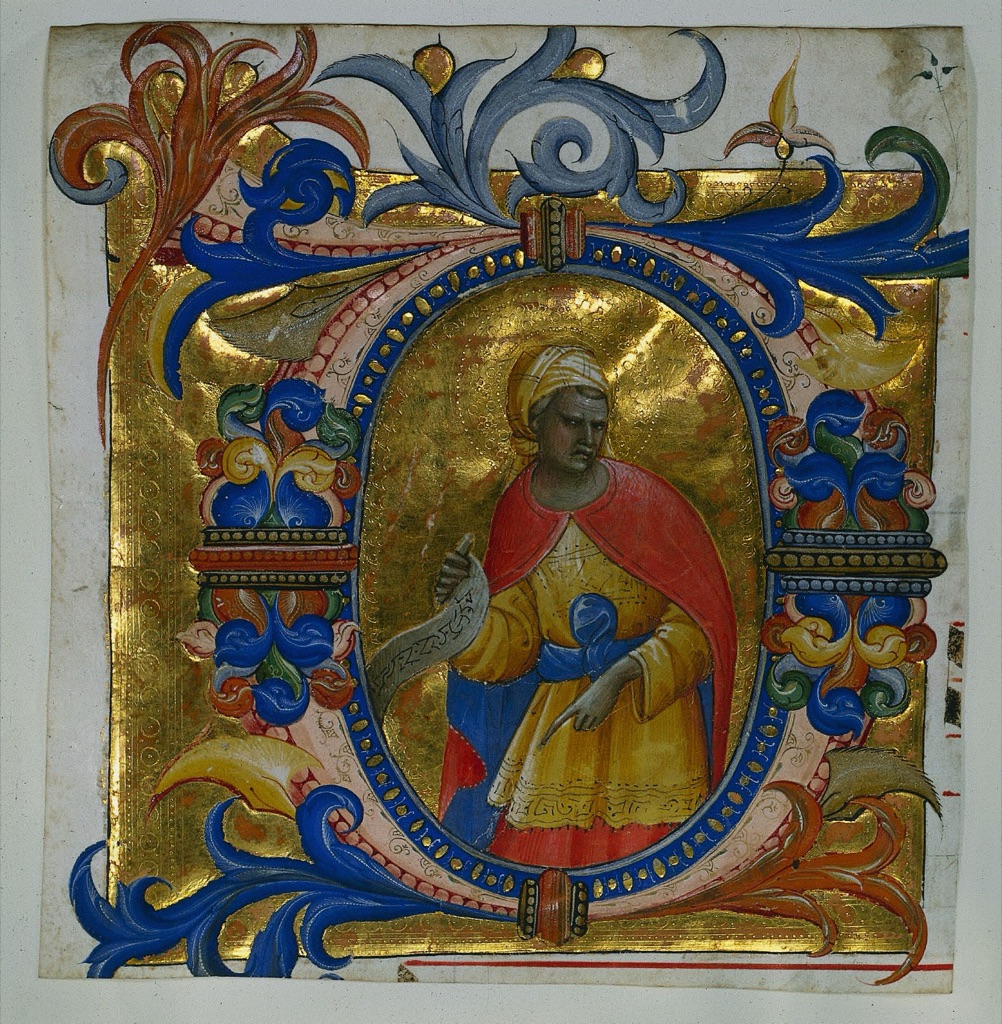 Repeated blue and orange-red foliage surrounds a prophet in yellow and red within a reflective punched-gold field.