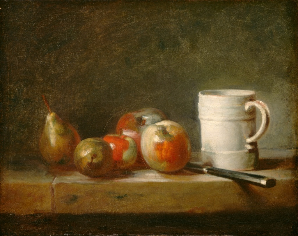 Chardin's still life sets apples, pears, a luminous white mug and a knife on a stone surface before a muted background.