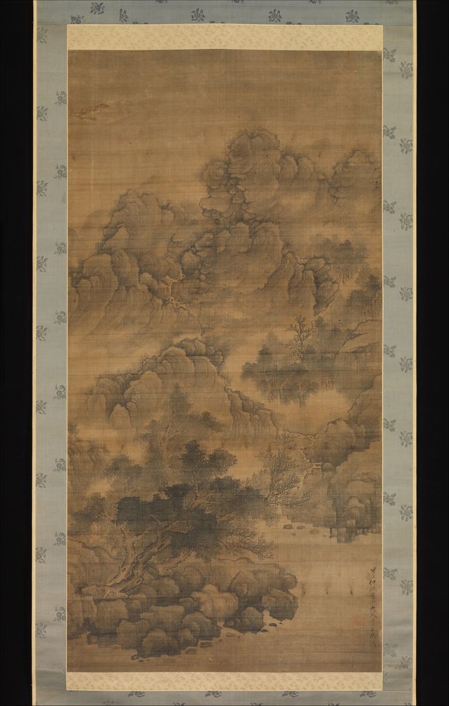 Dark foreground rocks and trees rise through pale mist-separated mountain layers in a tall ink landscape.
