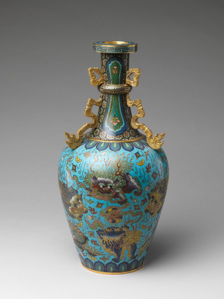 Doglike guardian lions move among auspicious emblems on a Qing cloisonné vase.