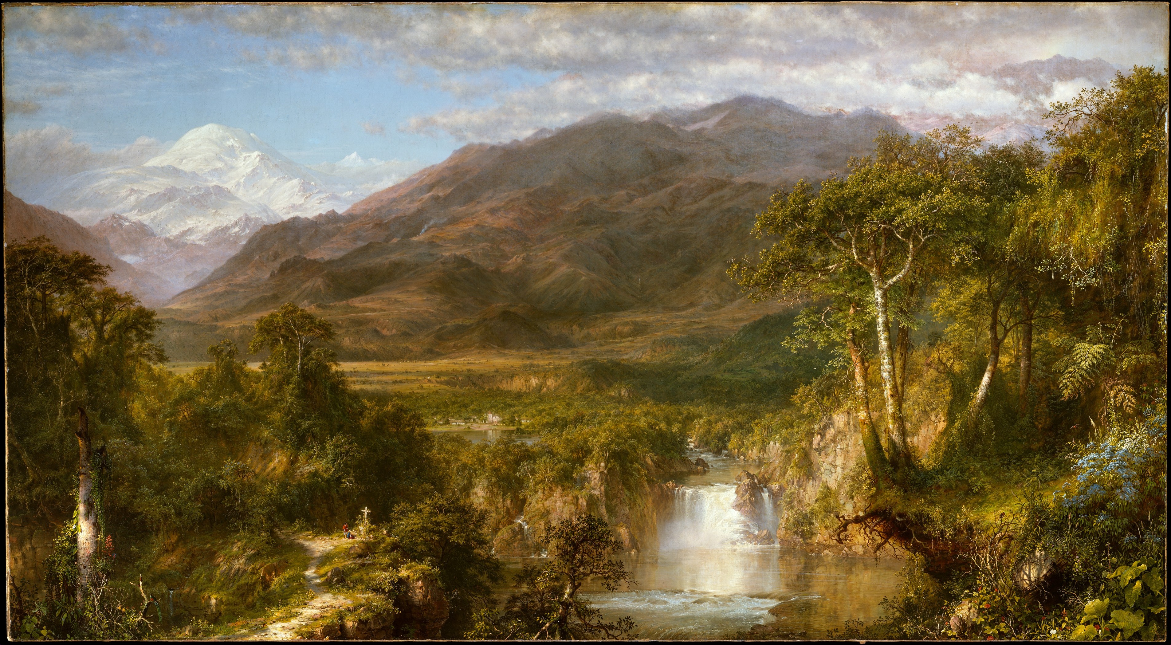 A wide landscape leads from detailed dark vegetation and water to pale misted mountains beneath a luminous sky.