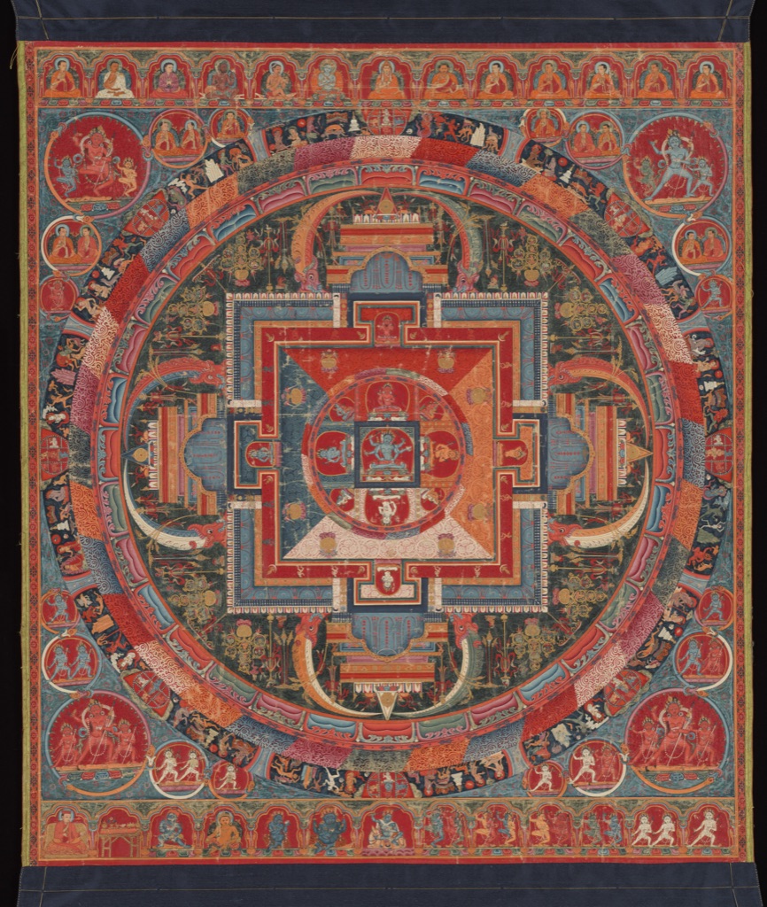 A Tibetan Mandala of Jnanadakini arranges many figures and coloured geometric fields around a dense central square and circle.