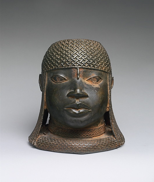 Cast brass commemorative head of an oba with a high beaded collar and patterned cap.