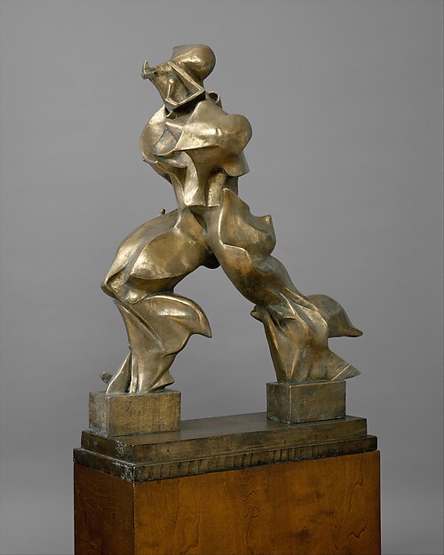 Polished bronze figure by Boccioni striding forward with abstracted flaring limbs.