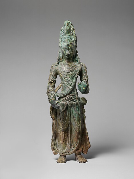Small Vietnamese gilt-bronze Avalokiteshvara standing on a lotus base.