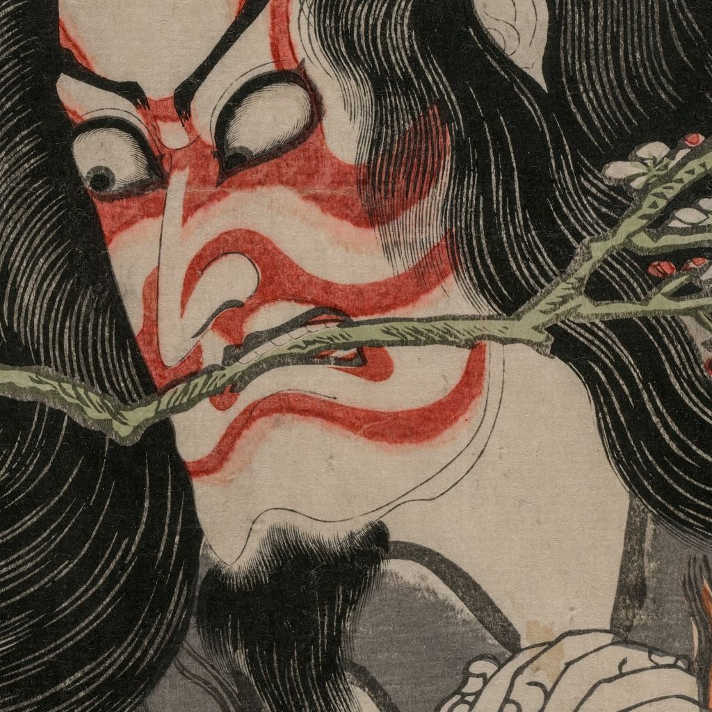 口元を横切る梅枝